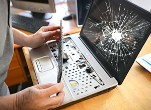 Technician repairing Chromebook